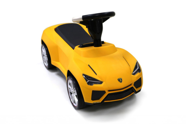 Gul Lamborghini Urus gåbil til børn - med lædersæde og stødabsorberende hjul.