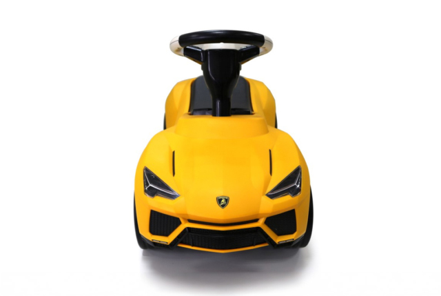 Gul Lamborghini Urus gåbil til børn - med lædersæde og stødabsorberende hjul.