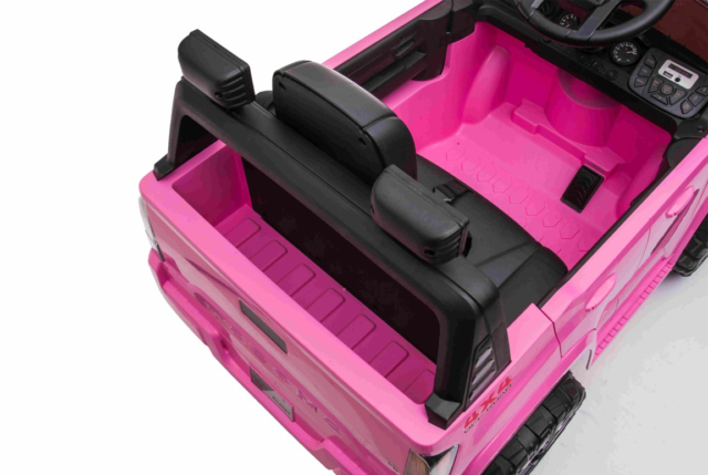Pink Toyota Tacoma elbil til børn med 2x12V motorer, lædersæde og musikanlæg.