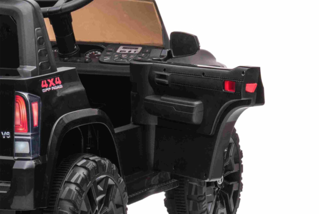 Sort Toyota Tacoma elbil til børn med 2x12V motorer, lædersæde og musikanlæg.
